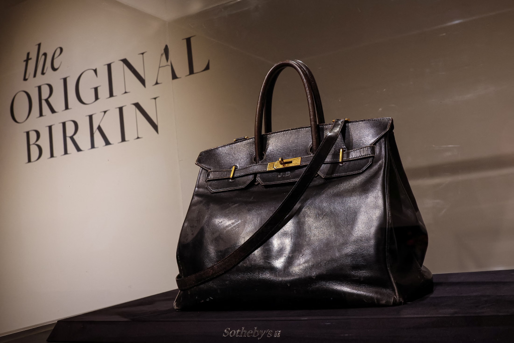 Classic Hermès Birkin bag in gold Togo leather with palladium hardware, hero image