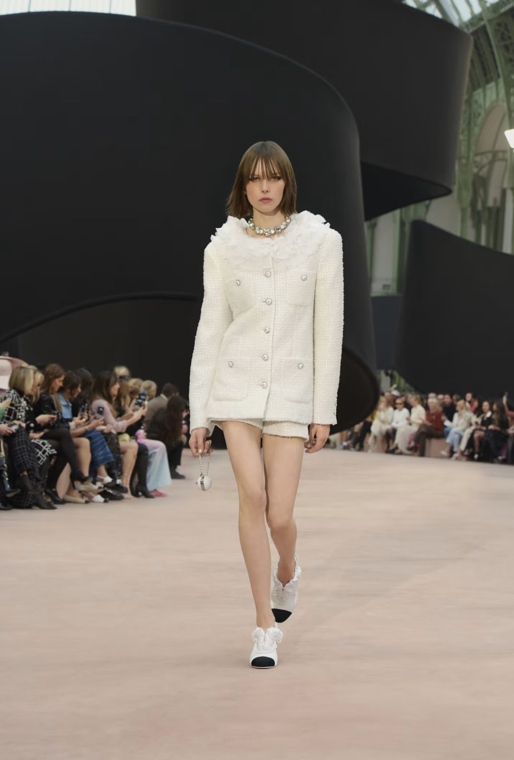 Model carrying Coco Sphere Minaudière – Fall Winter 2025/26