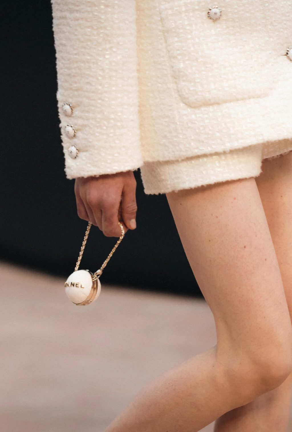 Model carrying Coco Sphere Minaudière – Fall Winter 2025/26