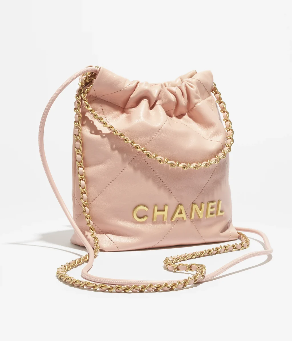 CHANEL 22 MINI HANDBAG / Shiny Calfskin & Gold-Tone Metal / Light Pink / $5,300