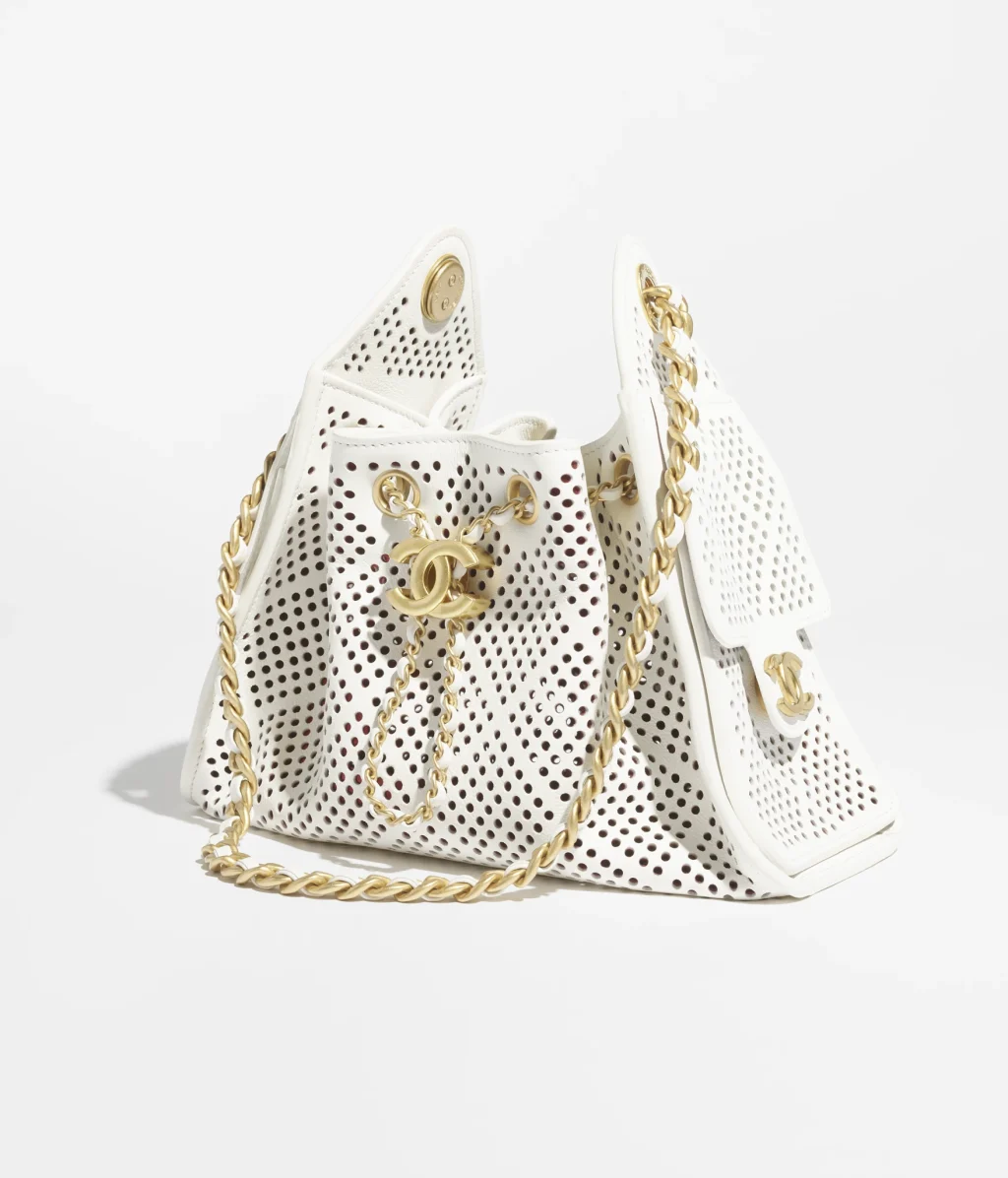 CHANEL 25 MINI HANDBAG / Perforated Calfskin & Gold-Tone Metal / White / $6,800