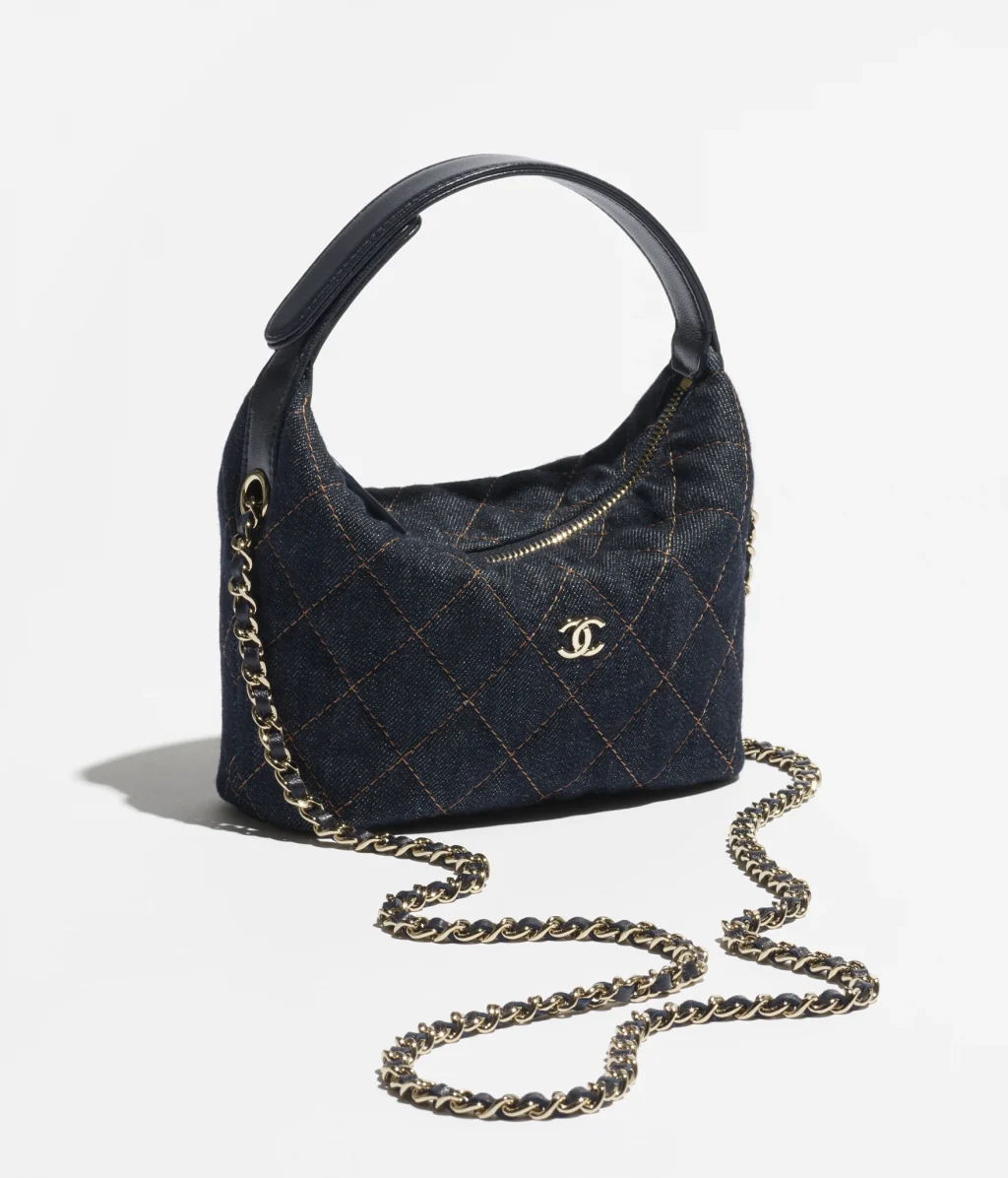 CHANEL CLASSIC CLUTCH WITH CHAIN / Denim & Gold-Tone Metal / Dark Blue & Orange / $3,400