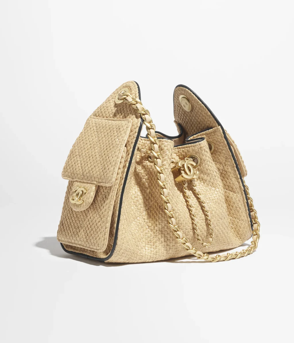 CHANEL 25 MINI HANDBAG / Braided Raffia, Calfskin & Gold-Tone Metal / Beige & Black / $6,000