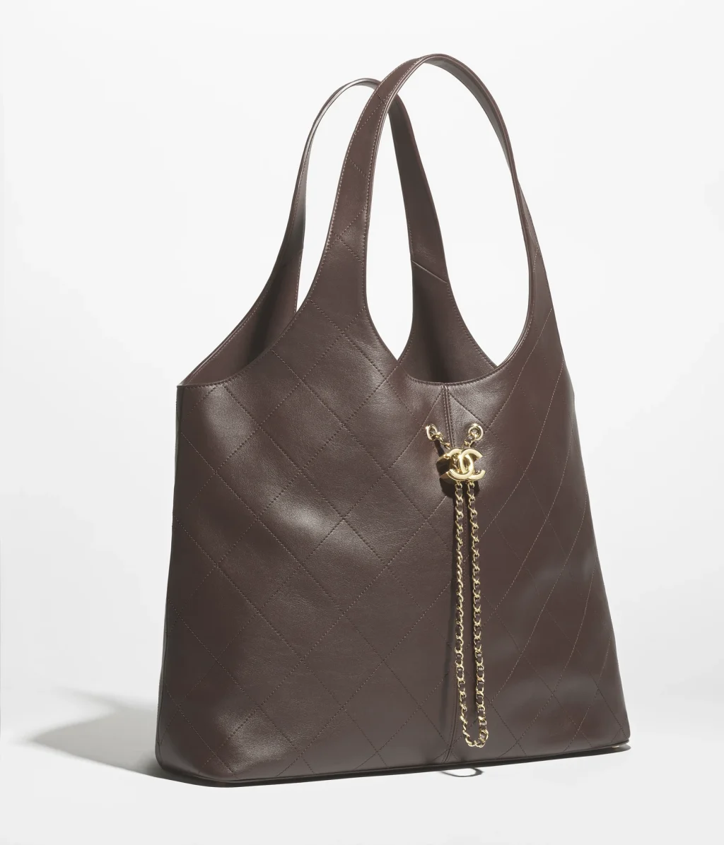 MAXI SHOPPING BAG /  Grained Calfskin & Gold-Tone Metal 
Dark Brown / $8,500
