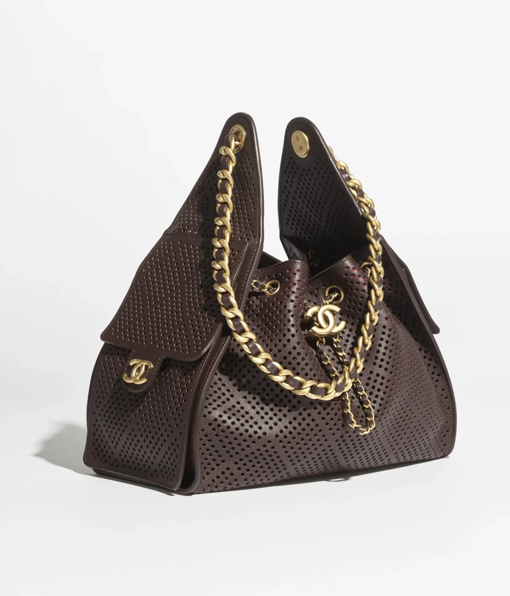 CHANEL 25 SMALL HANDBAG / Perforated Calfskin & Gold-Tone Metal / Dark Brown / $7,100