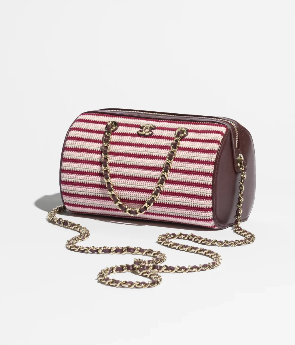 CHANEL CLUTCH WITH CHAIN / Crochet, Lambskin & Gold-Tone Metal / Burgundy, Gray & Pink / $5,225