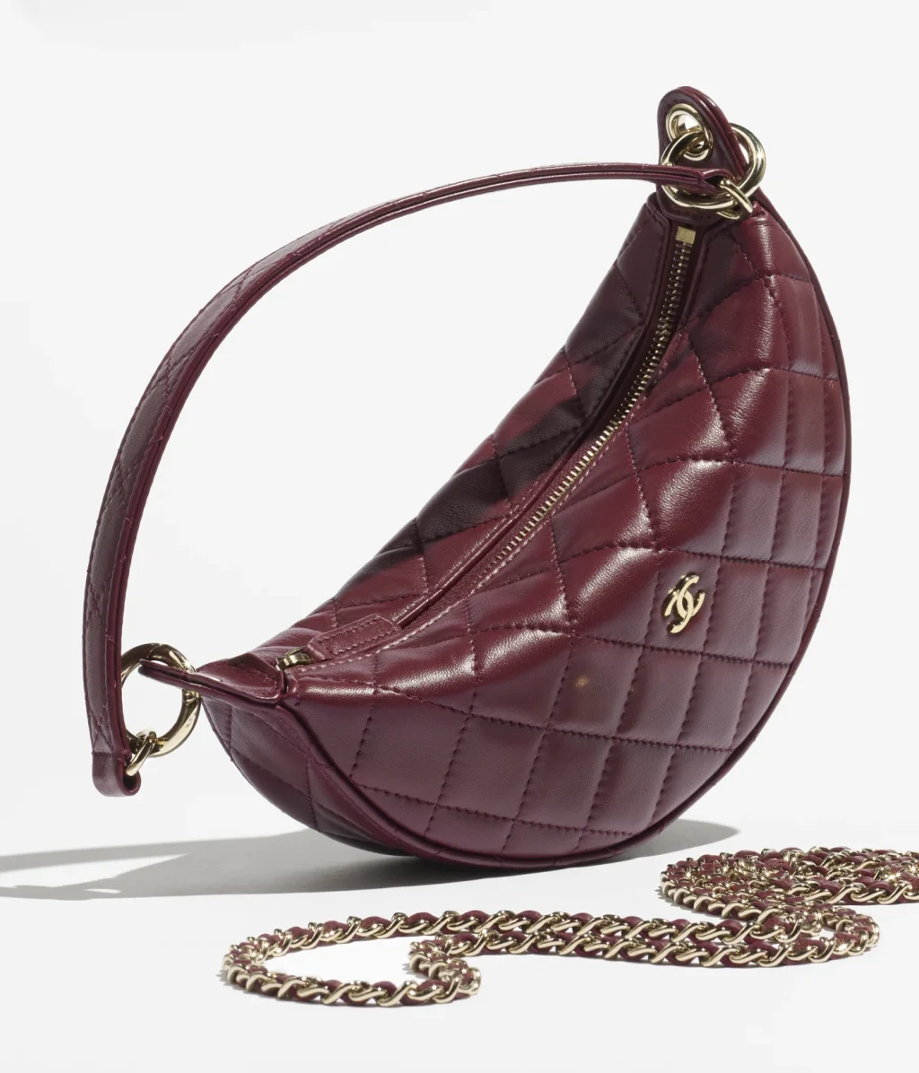 CLUTCH WITH CHAIN / Lambskin & Gold-Tone Metal / Dark Burgundy / $3,700