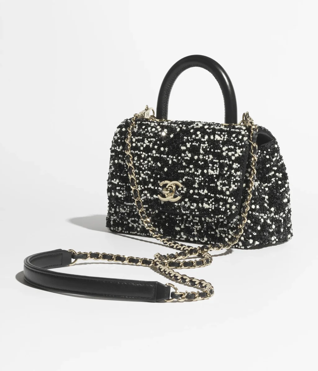 CHANEL MINI FLAP BAG WITH TOP HANDLE / Pearls, Sequins, Lambskin & Gold-Tone Metal / Black, White & Pearly White / $8,100