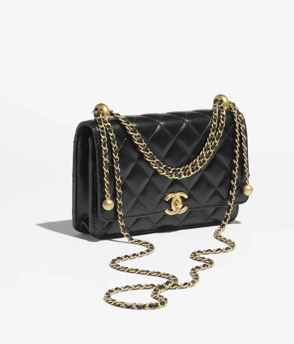 CHANEL WALLET ON CHAIN / Shiny Calfskin & Gold-Tone Metal / Black / $4,000