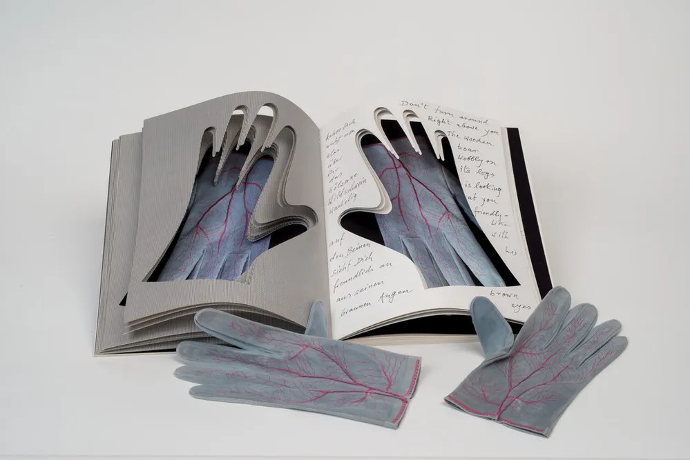 Meret Oppenheim, Glove (for Parkett, no. 4), 1985; Screenprint on goat suede with thread, 8 3/4 x 3 1/4 in.; National Museum of Women in the Arts, Gift of Thomas Hill, in memory of Rosemary Furtak; © ProLitteris Zurich, Courtesy of Lisa Wenger and Martin A. Bühler, Meret Oppenheim Estate; Photo by Lee Stalsworth